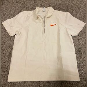 Nike Men's Cream Polo with Orange Logo